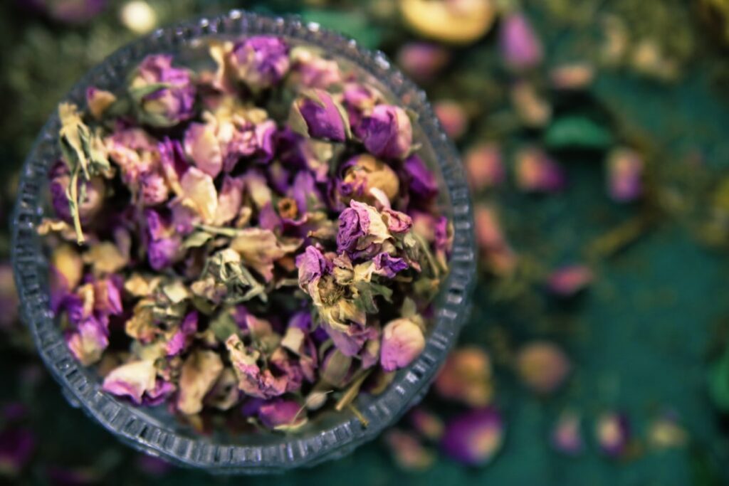 purple flowers on brown round basket